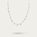 Necklace with drops of white crystals on a dainty silver chain