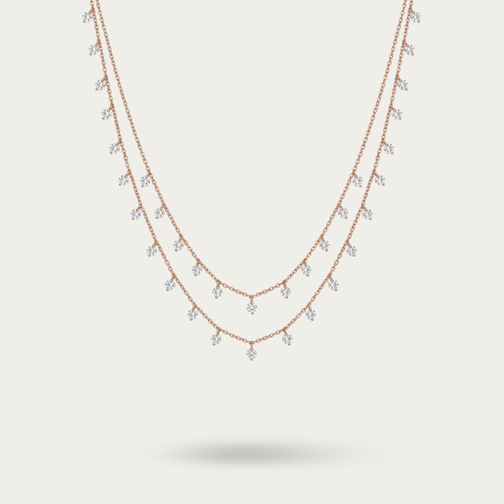 Magnificent sterling silver classic rose gold layered queens necklace.
