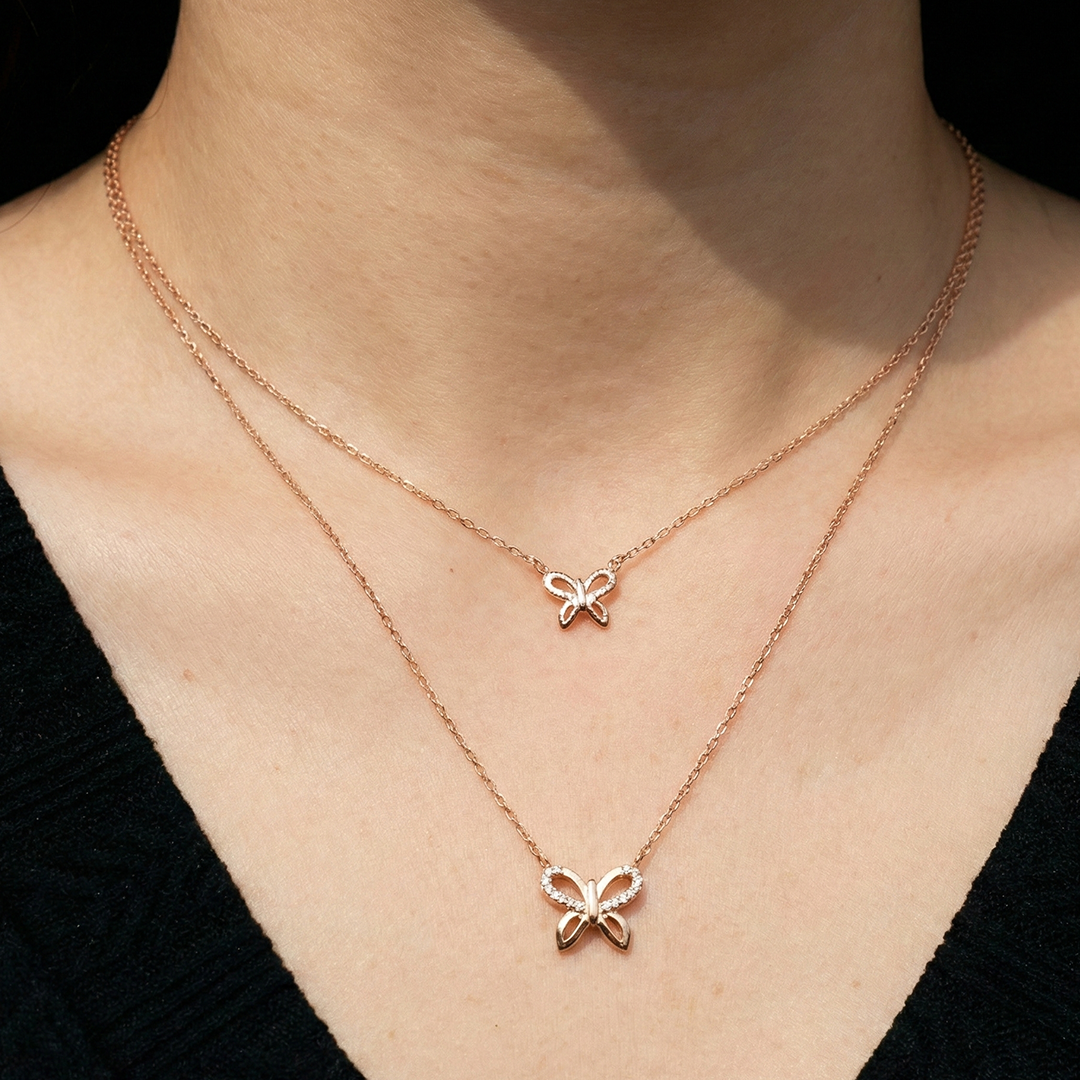 Butterfly shaped rose gold with white cz layered necklace