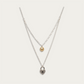 Necklace with heart shaped pendant and pearl drop