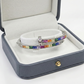 Blisse Allure Sterling Silver Rainbow Overlap Baguette cubic zirconia Bangle
