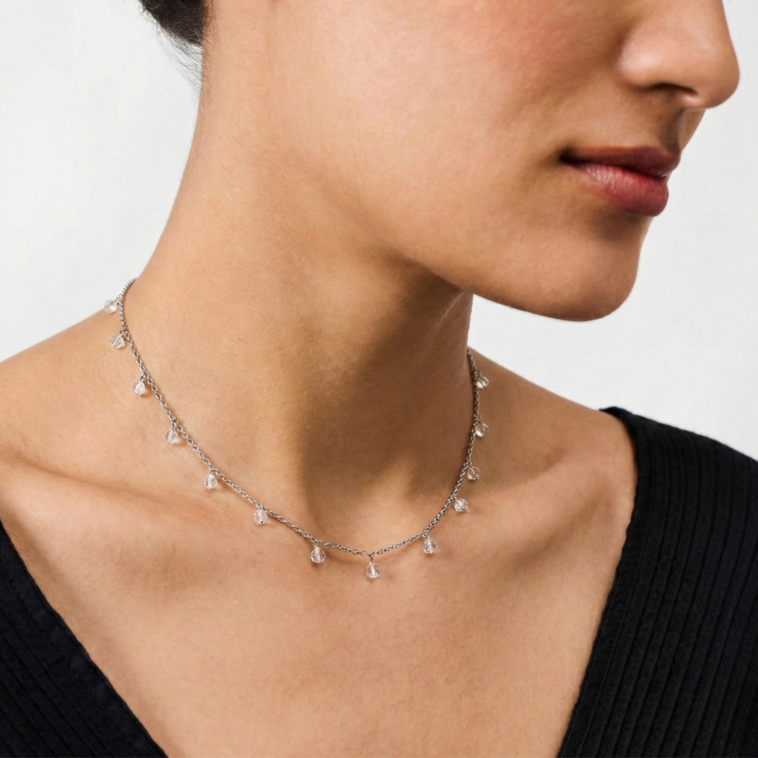 Necklace with drops of white crystals on a dainty silver chain