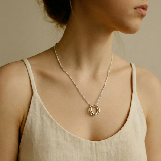 Blisse Allure Sterling Silver Necklace with 3 tone detachable rings.
